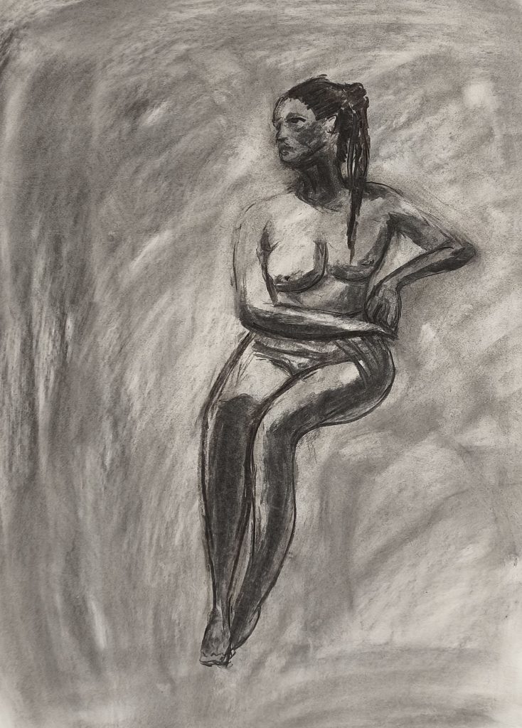 charcoal drawing on paper during life drawing
